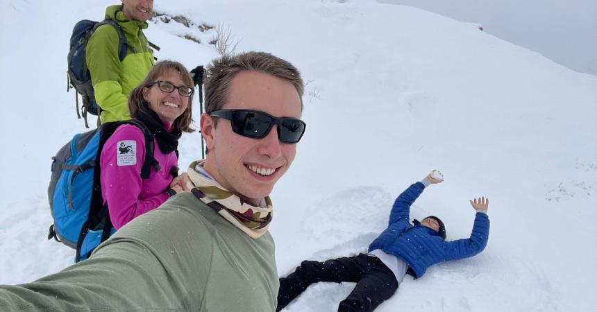 Young people on snowy mountain