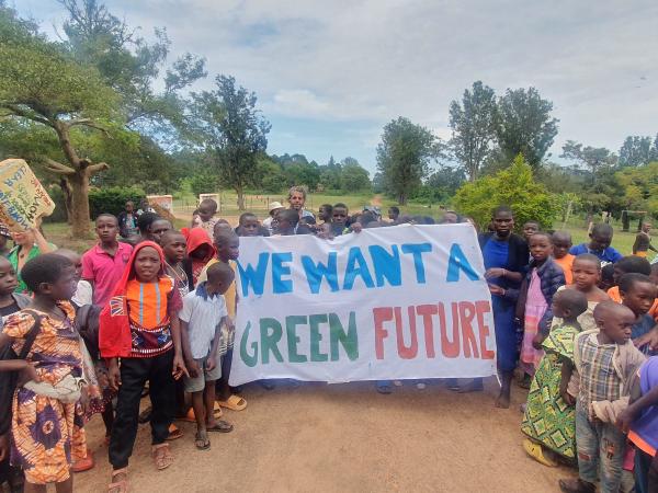 Children in Uganda march for a green future